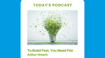 A light blue square with a bulb enveloped in leaves in the center